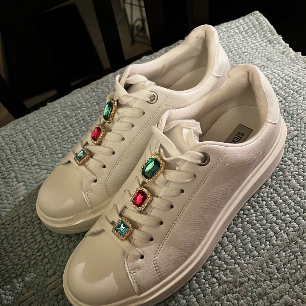 Steve Madden white sneakers .